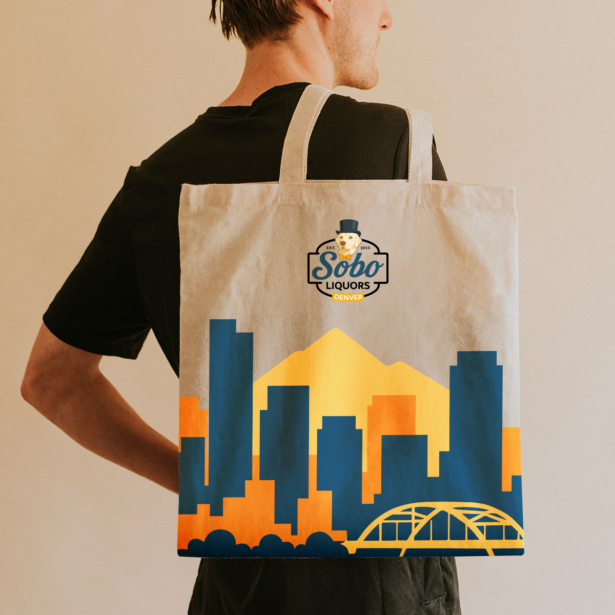 Sobo Liquors branded tote bag with Denver skyline design